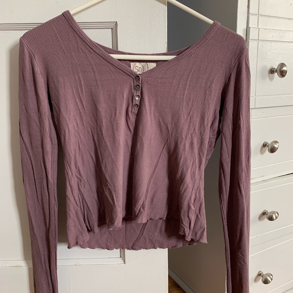 Button up long sleeve tee shirt w/ lettuce edges.